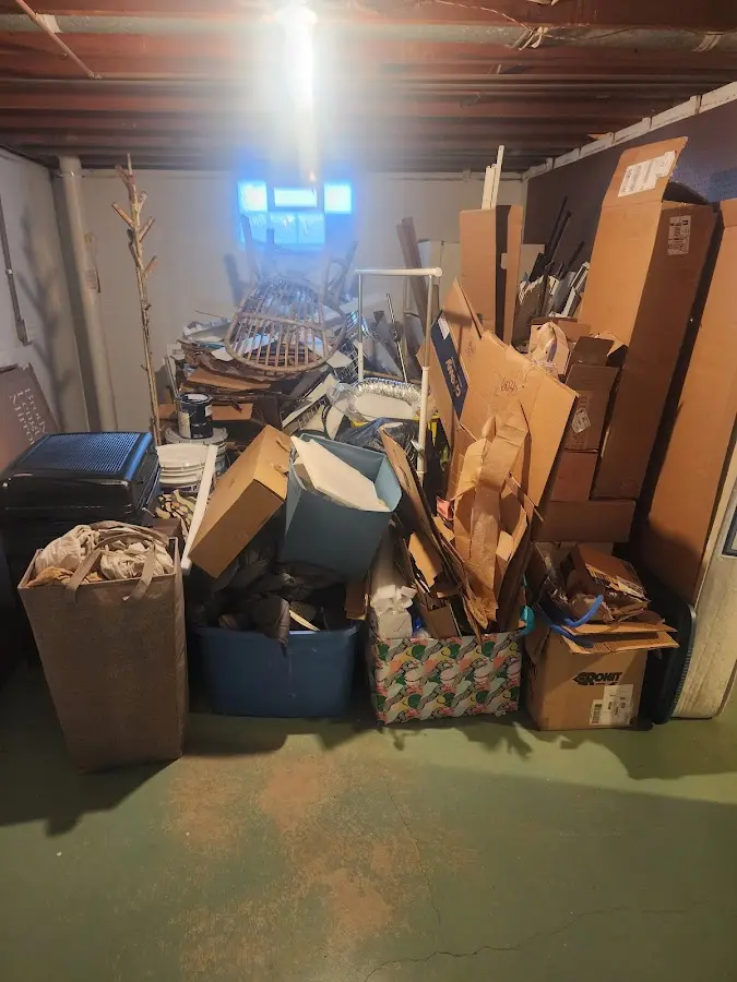 Roll-off dumpster container at job site for Yard Waste Dumpster Rental in Milliken